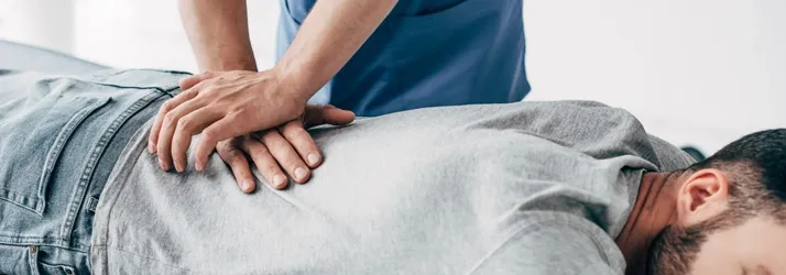 Chiropractic adjustment being performed at Chiro-Med in Orland Park, IL